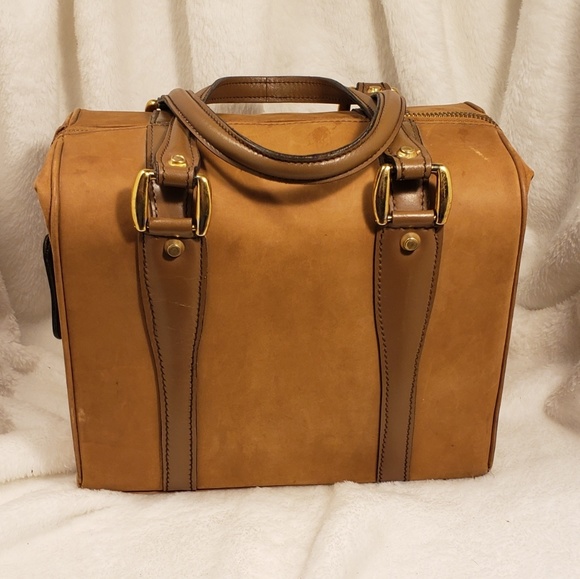 italian leather luggage brands